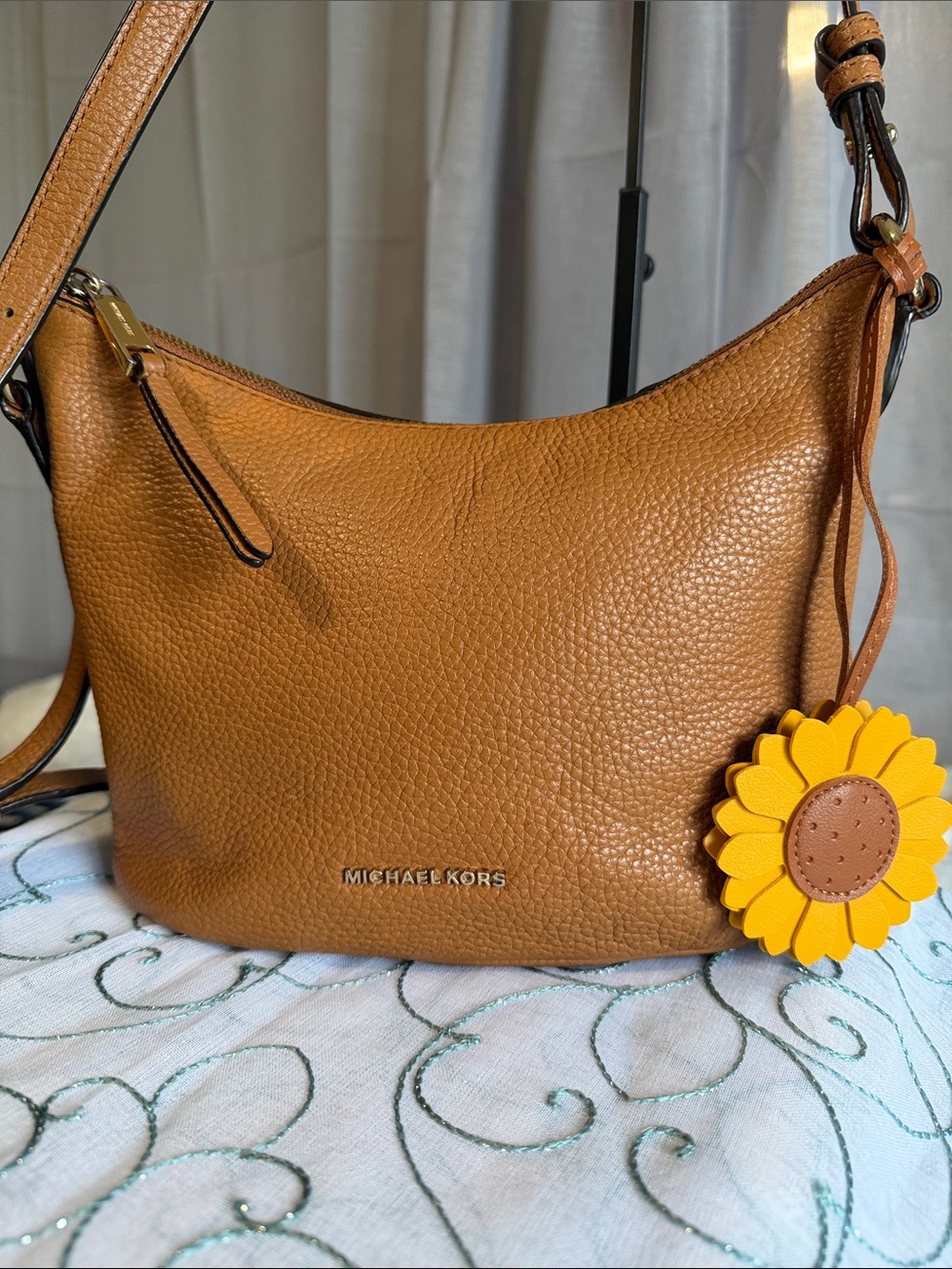 Michael Kors Pebbled Leather Shoulder Bag in Cognac with Yellow Flower Charm